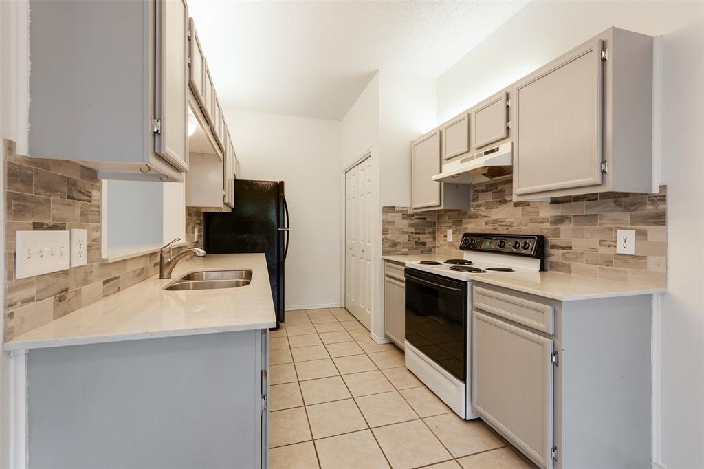 9100 Mountain Ridge DR #105 — photo 5